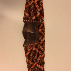Black/orange beaded stretchy belt w/ wooden clasp